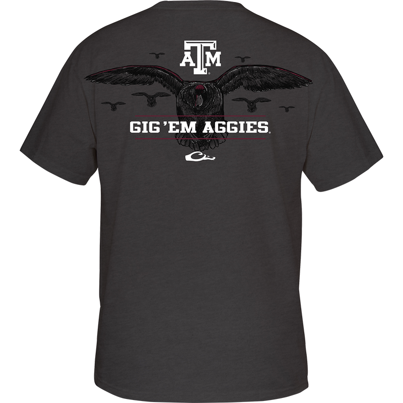 Texas A&M Cupped Up T-Shirt: Back artwork of a stylized duck scene with other ducks in the background, featuring your school's logo and catchphrase. Front left chest displays the Drake logo in your school's color.