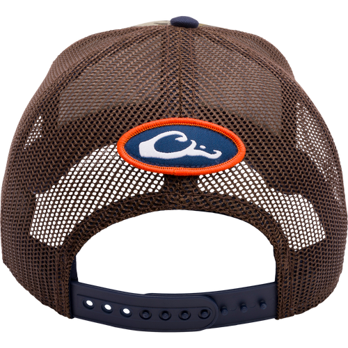 Auburn Bottomland Mesh Back Cap with Mossy Oak Bottomland Camo pattern. Features 3D embroidered college logo, structured crown, mesh back panels, and adjustable snap-back closure. Ideal for hunting and outdoor enthusiasts.