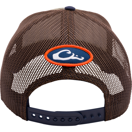 Auburn Bottomland Mesh Back Cap with Mossy Oak Bottomland Camo pattern. Features 3D embroidered college logo, structured crown, mesh back panels, and adjustable snap-back closure. Ideal for hunting and outdoor enthusiasts.