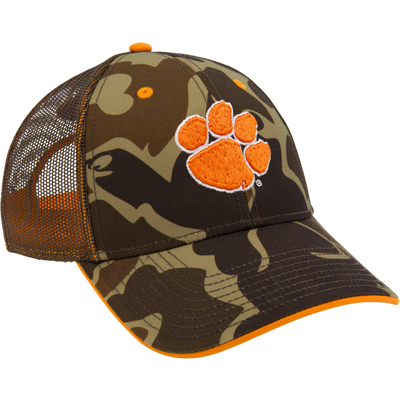 Clemson Old School Cap, trucker-style with mesh back, features a woodland camo print and orange paw-print logo, adjustable snap-back, low-profile design.