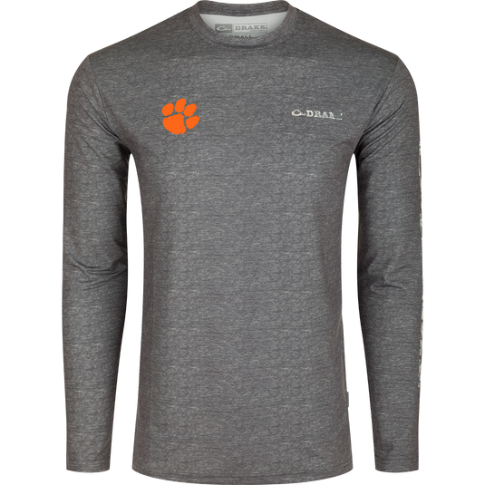 Clemson Performance Heather Long Sleeve Crew: A grey shirt with an orange paw print, designed for exceptional functionality and performance. Lightweight, moisture-wicking, and quick-drying fabric with UPF 50 sun protection. Perfect for all-year wear in various weather conditions.