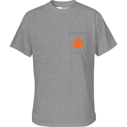 Clemson Beach T-Shirt: Grey tee with a paw print and school logo on the chest pocket. Back artwork features a beach scene with the school's logo.