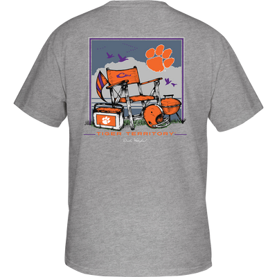 Clemson Beach T-Shirt: Back view of a grey t-shirt with orange and purple designs, featuring a beach scene and school logo. Front showcases school logo on chest pocket.