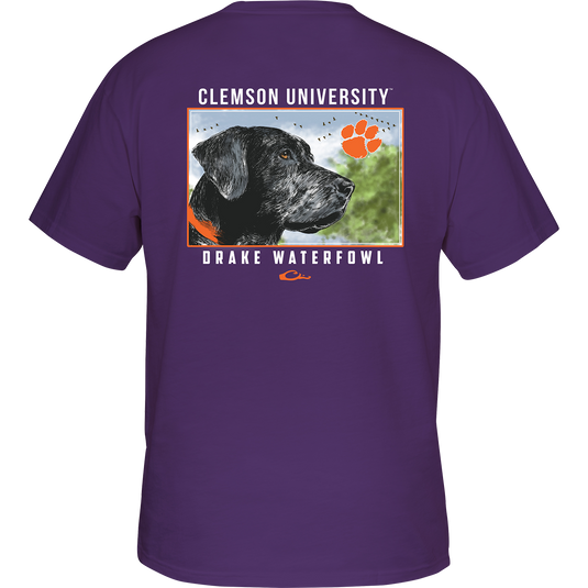 Clemson Black Lab T-Shirt: Back of purple shirt with a dog scene featuring your school's logo and "Drake Waterfowl" text. Front chest pocket with school logo.