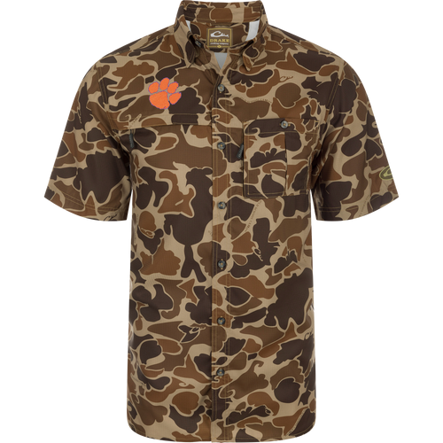 Clemson 8-Shot Short Sleeve Shirt with camouflage pattern, featuring button-down collar, chest pockets, and embroidered paw-print logo, designed for moisture wicking and sun protection.