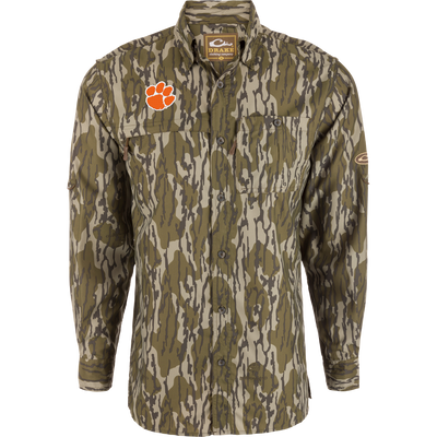Clemson 8-Shot Long Sleeve Shirt with a green-tan camouflage pattern, featuring chest pockets, bright orange paw logo, ideal for hunting with moisture-wicking and UPF30 protection.