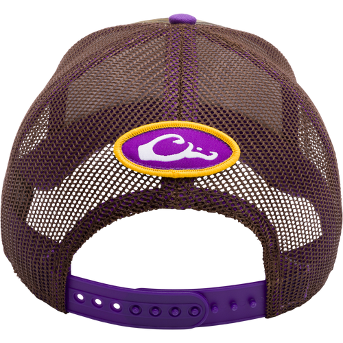 LSU Bottomland Mesh Back Cap: A purple and yellow trucker hat featuring Mossy Oak Bottomland Camo pattern, 3D embroidered college logo, and adjustable snap-back closure. Ideal for hunting and outdoor enthusiasts.
