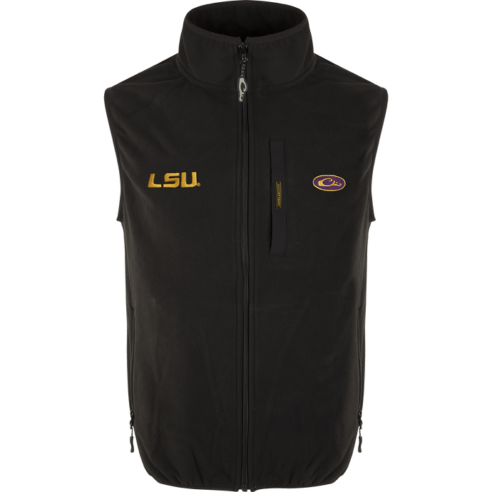 A black Windproof Layering Vest with LSU logo embroidery on the right chest. Features include a stand-up collar, Magnattach™ left chest pocket, and lower hand warmer pockets. Made of 100% polyester, this vest is windproof, water-resistant, and ultra-warm. Perfect for outdoor activities.