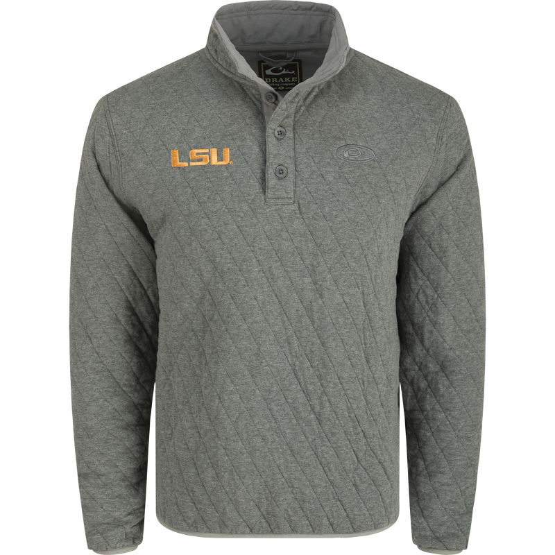 LSU Delta Quilted 1/4 Snap Sweatshirt: A midweight, brushed BCI Cotton sweatshirt with diamond quilting for warmth. Features a team logo and elastic cuffs.