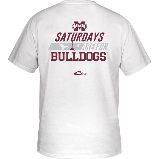Mississippi State Saturdays T-Shirt: Back of a white shirt with red text saying "Saturdays are for" and a logo. Front features school logo on chest pocket.