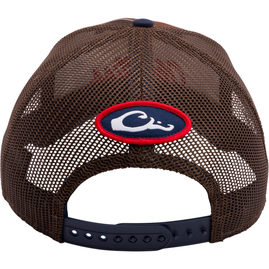 A Drake Waterfowl Ole Miss Old School Cap featuring exclusive Old School Original Camo pattern, structured crown, X-Peak visor, and embroidered college logo. Snap-back closure for adjustability.