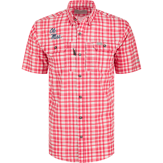 Ole Miss Hunter Creek Windowpane Plaid Short Sleeve Shirt, a lightweight polyester shirt with built-in cooling, stretch, and UPF 30 sun protection. Features a hidden button-down collar, vented cape back, and button-through flap chest pockets. Classic game day style.