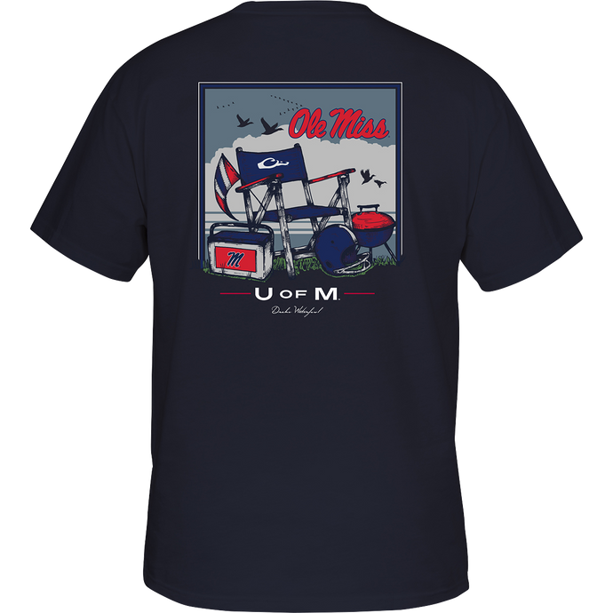 Ole Miss Beach T-Shirt: Back of a t-shirt with a barbecue picture, boat and flag. Chair and helmet on grass, blue and white logo flag, red and white sign with letter M. Red, white, and blue flag. Red text on a blue background. Rectangular box with a letter on it. Blue jacket with a chair and helmet picture. T-shirt with a graphic design.