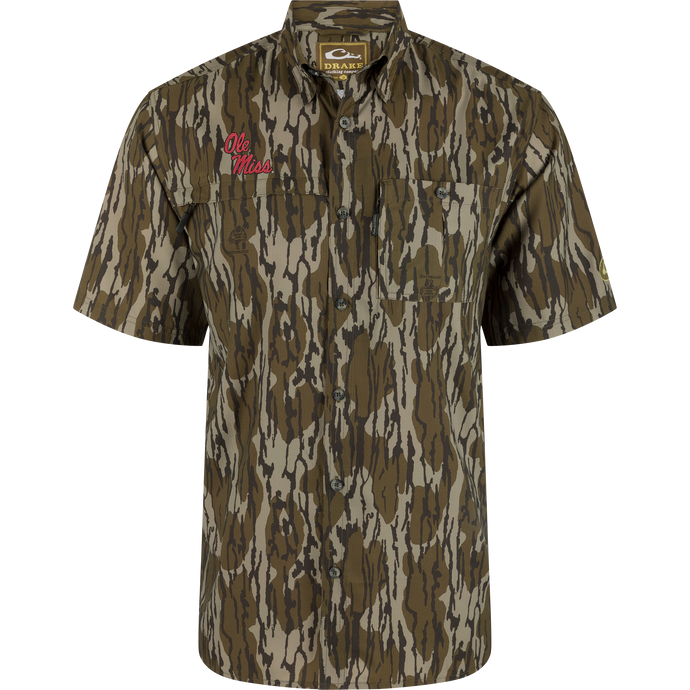Ole Miss 8-Shot Short Sleeve Shirt in tree bark camo with camp collar, two chest pockets, embroidered logo, ideal for hunting with technical performance features.