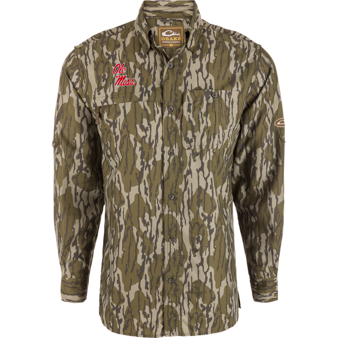 Ole Miss 8-Shot Long Sleeve Shirt with camo pattern, featuring chest pockets, embroidered logo, hidden zippers, and vented back, ideal for outdoor activities.