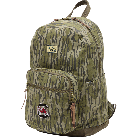 South Carolina Throwback 80 Backpack with camo pattern, featuring a main compartment, front pocket with patch, side pockets, leather tabs, and Drake label.