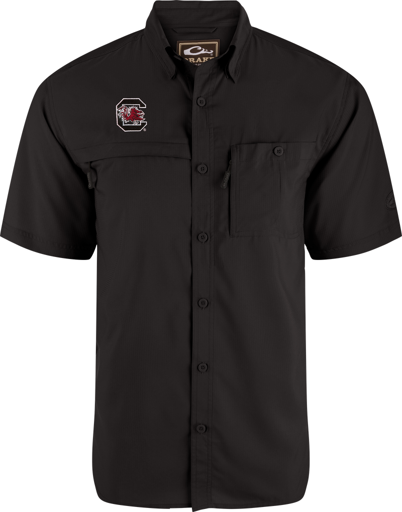 South Carolina 8-Shot Short Sleeve Shirt with chest pockets, Gamecocks logo, and vented cape back, designed for outdoor enthusiasts with moisture-wicking, sun protection, and stretch fabric.