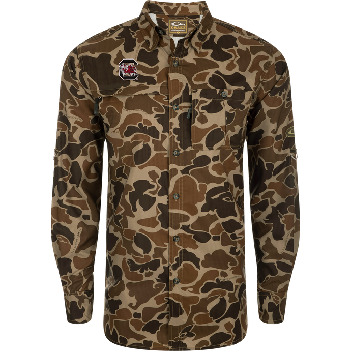 South Carolina 8-Shot Long Sleeve Shirt featuring a camouflage pattern, button-up design, Gamecocks logo, vented cape back, and dual chest pockets with hidden zippers.