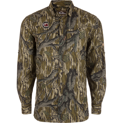 South Carolina 8-Shot Long Sleeve Shirt in woodland camo with Gamecocks logo, featuring button-front, chest pockets, and vented back for hunting and outdoor activities.