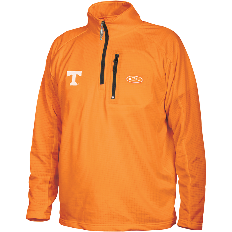 Tennessee Breathelite™ 1/4 Zip: Ultralight orange jacket with square check fleece backing. Features University of Tennessee logo embroidery on right chest.