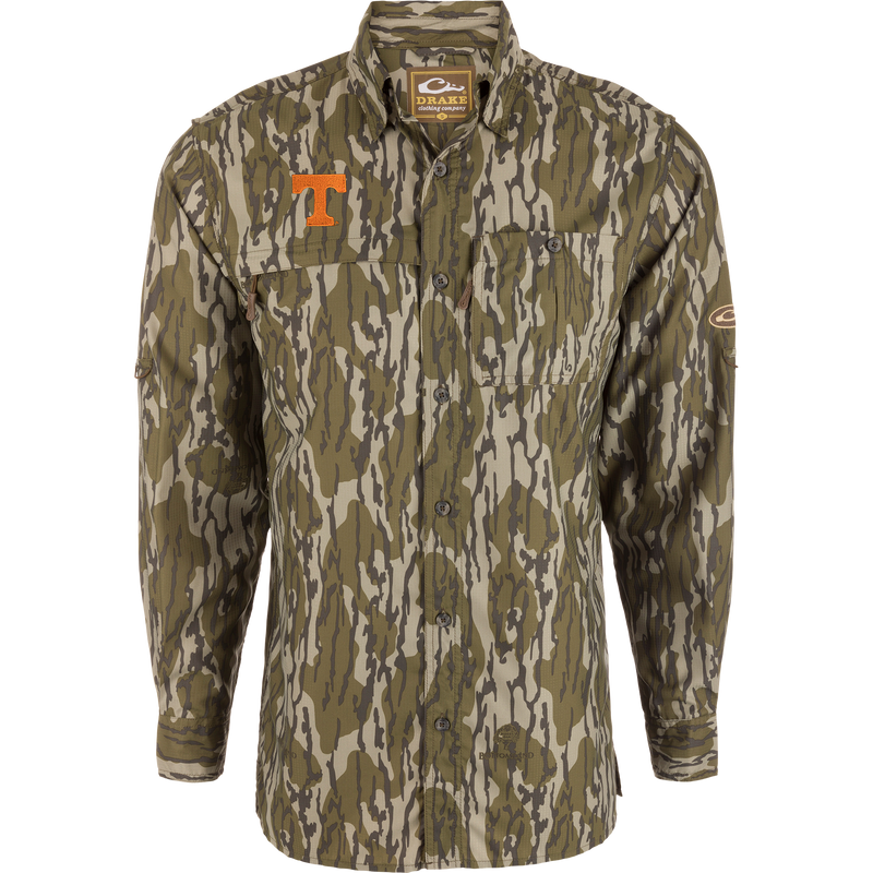 Tennessee 8-Shot Long Sleeve Shirt with green-tan camo print, two chest pockets, bright-orange “T” logo, and Drake Clothing Company label inside collar.