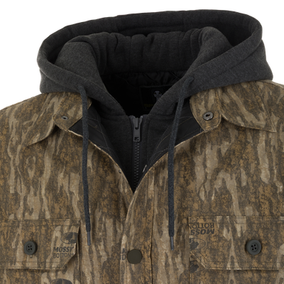 Camouflage waterfowl outerwear button-up jacket worn over a dark grey Spoonie Campfire Hoodie zip-up liner.