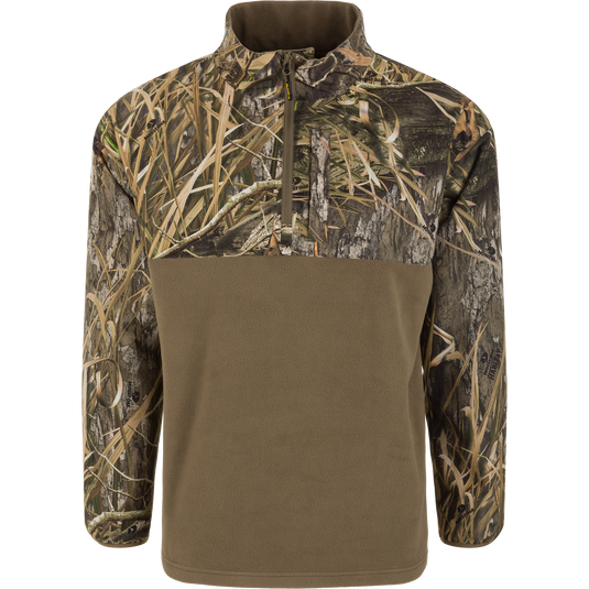 Spoonie Eqwader Quarter Zip pullover in Mossy Oak Shadow Grass Habitat featuring a solid olive lower body and a camouflage-patterned upper chest, sleeves, and collar.