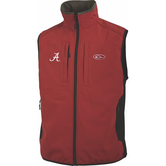 Alabama Windproof Tech Vest - A red vest with a white logo, made of 100% polyester with a bonded fleece lining. Lightweight and windproof, perfect for blocking out the wind. Features multiple pockets and side stretch panels. Ideal for layering or casual wear.
