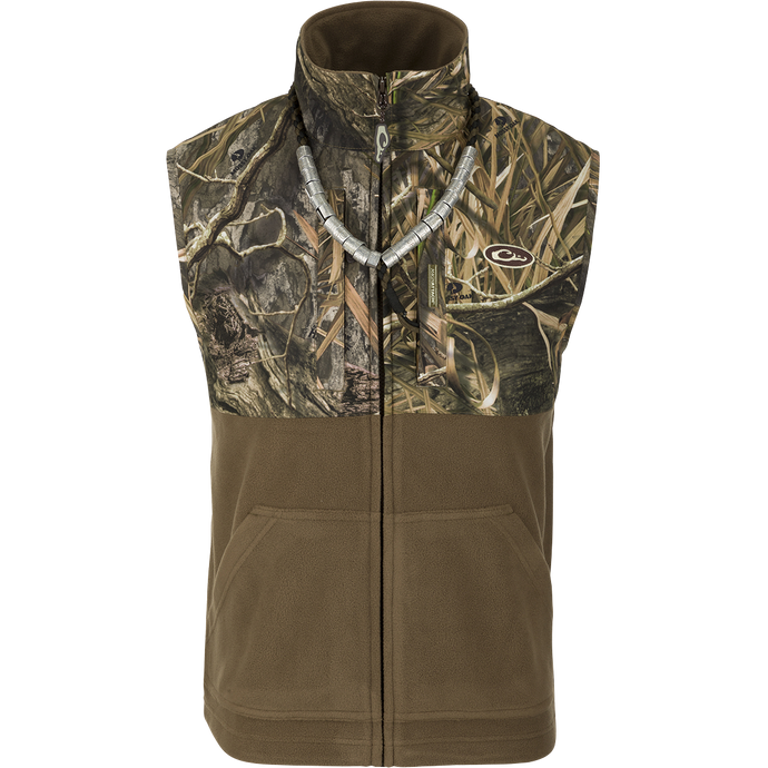 MST Women's Eqwader Vest: A camouflage vest with waterproof protection in the shoulders and moisture-wicking fleece in the lower torso. Features multiple pockets for storage.