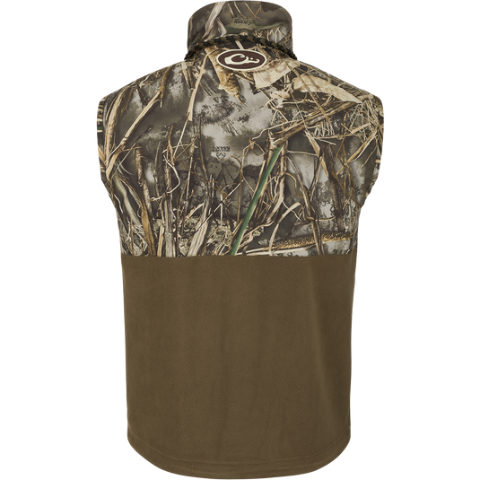MST Eqwader Vest: A camouflage vest with waterproof protection, fleece-lined upper body, and multiple pockets for storage.