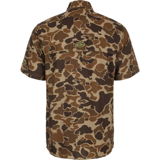 A lightweight Dobby fabric shirt with our exclusive Old School Camo pattern. Features a hidden button-down collar, vented cape back, and multiple pockets with hidden zippers. The Drake 8 Shot Shirt offers UPF30 sun protection and quick-drying, moisture-wicking performance. Perfect for hunting and outdoor activities.