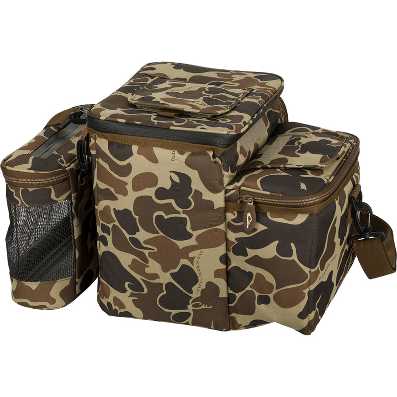 Wingshooter's Shell Boss: A rugged camouflage bag with straps, featuring a 12-Can/Bottle cooler compartment and quick-access flap for shells. Includes a removable mesh game bag for carrying birds. Perfect for hunting trips.