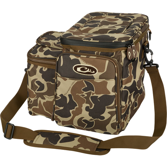 Wingshooter's Shell Boss: A rugged camouflage bag with a strap, perfect for carrying essentials and hydration into the dove field. Features a 12-Can/Bottle cooler compartment, quick-access flap for shells, and a removable mesh game bag.