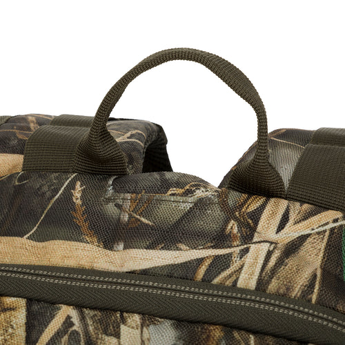 A close-up of the Vertical Zip Daypack, a rugged bag made of 100% Polyester Rugged HD2™ Material. It features large zippered interior storage, external carry straps, and adjustable shoulder and waist straps. Perfect for hunting, travel, or everyday use.
