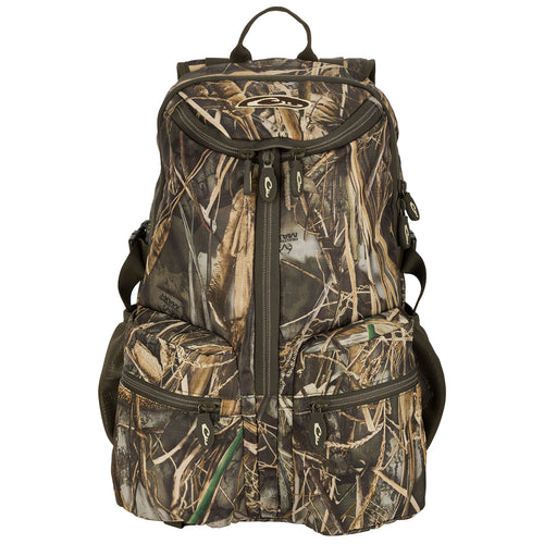 A compact, functional Vertical Zip Daypack with camouflage pattern. Ideal for hunting, travel, or everyday use. Features include large interior storage, external carry straps, and adjustable shoulder and waist straps. Made with rugged HD2™ material and Fowl-Proof™ YKK zippers.