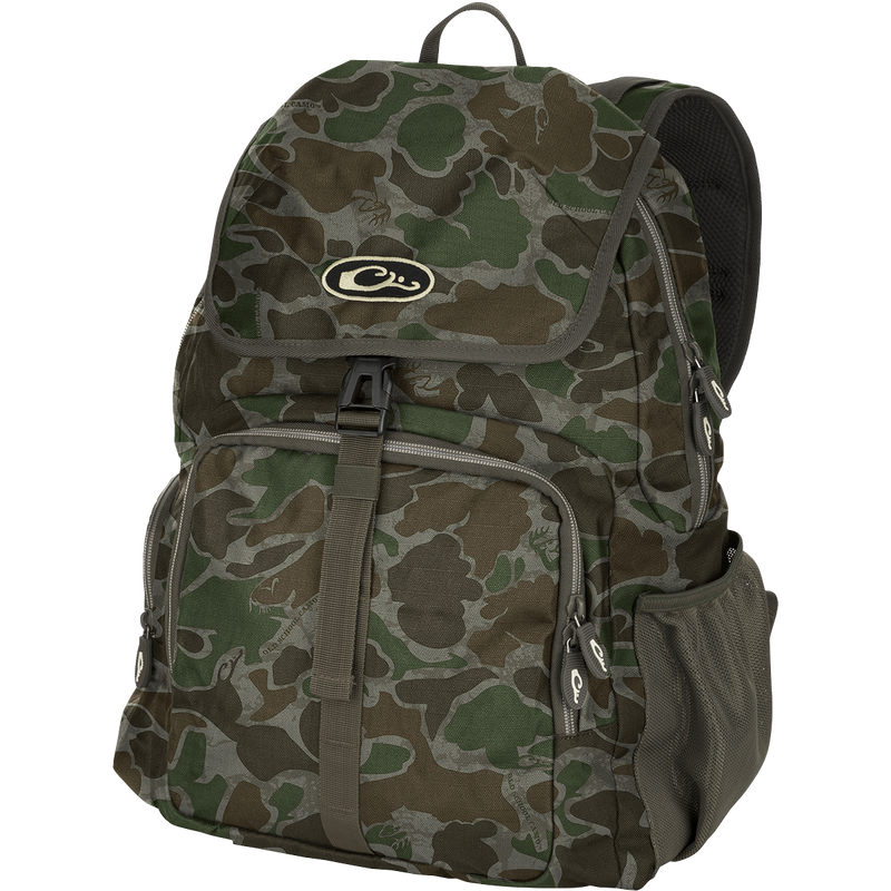 Essentials Daypack: A rugged backpack with exterior carrying straps, mesh hydration pouch pocket, and adjustable chest strap. Perfect for range, classroom, or field.