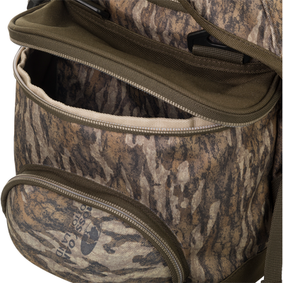 A close up of the Large Blind Bag by Drake Waterfowl, featuring 18 pockets for organizing gear. Waterproof construction with durable nylon/TPU bottom and vinyl liners. Improved thermos/jacket sleeve and adjustable shoulder strap. Dimensions: 18