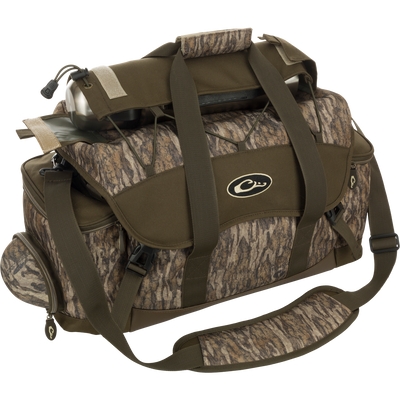 A large camouflage duffel bag with water bottle, featuring 18 pockets for organizing gear. Waterproof, durable, and abrasion-resistant construction. Adjustable shoulder strap and various storage compartments. Dimensions: 18