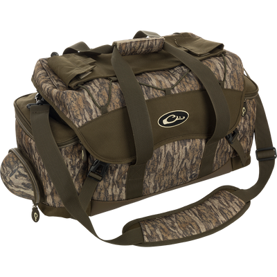 A Large Blind Bag with camouflage pattern and multiple pockets for organizing gear. Waterproof construction with durable materials for long-lasting use. Adjustable shoulder strap for easy carrying. Ideal for hunting and outdoor activities.