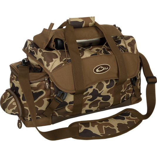 Large Blind Bag: A camouflage duffel bag with 18 organizational pockets for quick gear access. Waterproof construction with durable Nylon/TPU bottom. Adjustable shoulder strap, sunglass holder, and more. Dimensions: 18