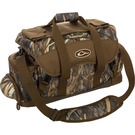A large blind bag with camouflage pattern and multiple pockets for organizing gear. Waterproof construction with durable materials for long-lasting use. Adjustable straps for comfortable carrying. Dimensions: 18