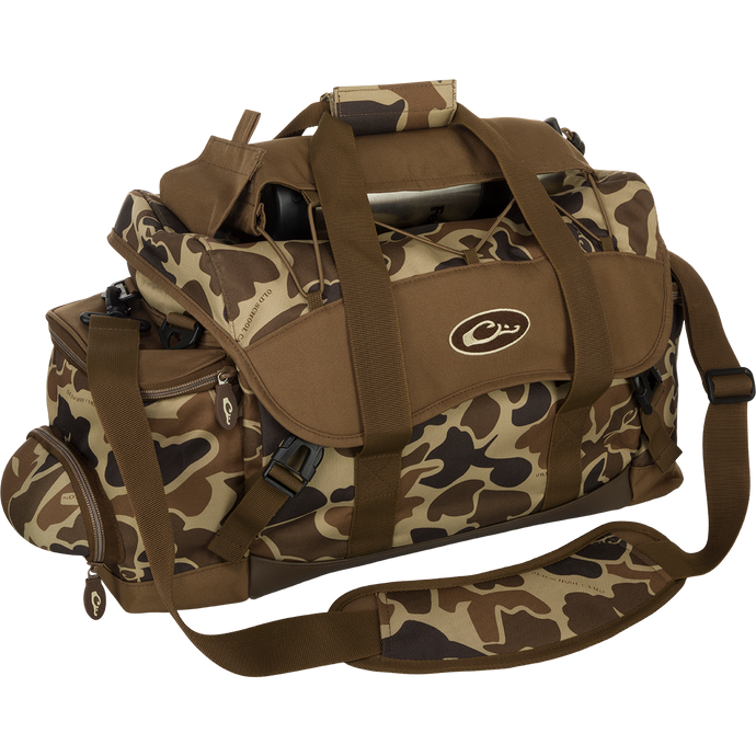 A waterproof camouflage duffel bag with 20 pockets for organizing gear - Extra Large Blind Bag by Drake Waterfowl.