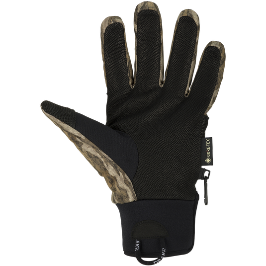 A fully waterproof glove for the early season: EST Refuge HS GORE-TEX Gloves. Constructed with Refuge HS shell fabric and a GORE-TEX membrane for 100% waterproof/breathable protection. Features include a digitized goat skin leather palm and gusseted neoprene cuffs. Stay-Put liner system ensures no twisting or bunching. Adjustable gusset Velcro cuff closure and pull loop assist for easy wear.