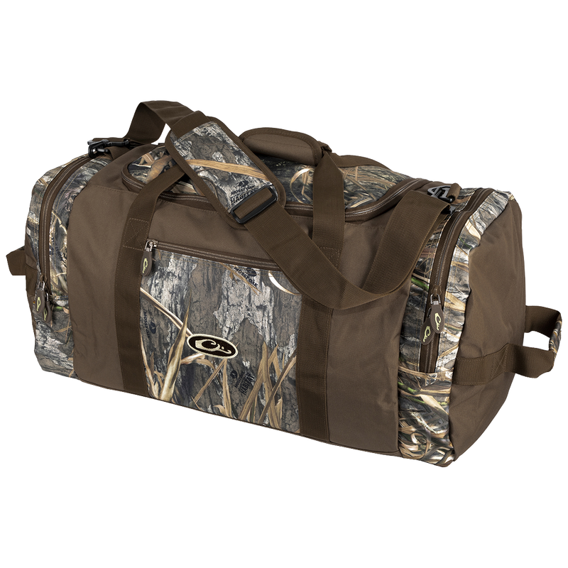 A rugged Duffle Bag made of 600-denier polyester fabric. Features adjustable shoulder strap, large center storage area, 2 side pockets, and a front pocket. Available in Medium and Large sizes. Ideal for hunting, camping, and outdoor adventures.