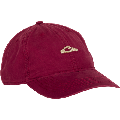 Cotton Twill Logo Cap - A low-profile red hat with a gold hand logo. Crafted with 100% cotton twill, leather strap backing with brass buckle, and contoured bill. Perfect for pushing yourself to the limit in style.