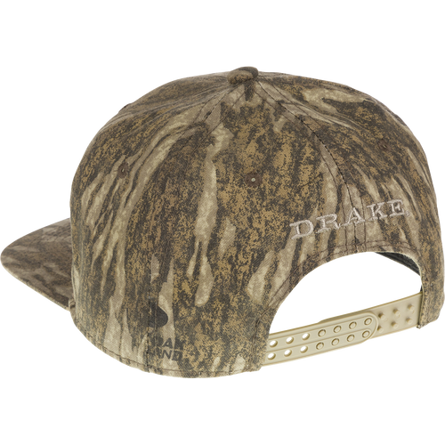 Camo Flat Bill Cap with raised embroidered logo and adjustable snapback closure. 6-panel construction for a good fit.