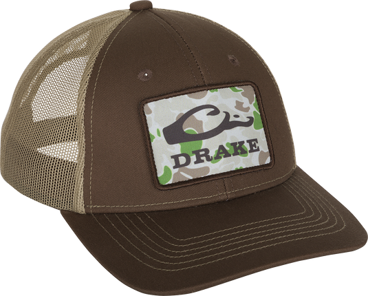A brown hat with a camouflage patch, 6-panel structured crown, pre-curved visor, and adjustable snap-back closure.