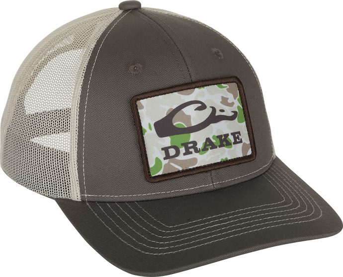 Old School Patch 2.0 Mesh Back Cap - A stylish hat with a patch featuring a snake. 6-panel structured crown, pre-curved visor, and adjustable snap-back closure.