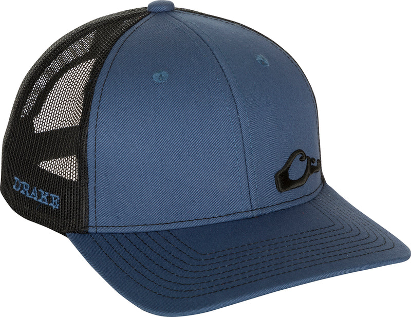 Enid Mesh Back Cap featuring Drake head logo on front panel, a classic trucker cap with 6-panel construction, structured front panels, and adjustable snapback.