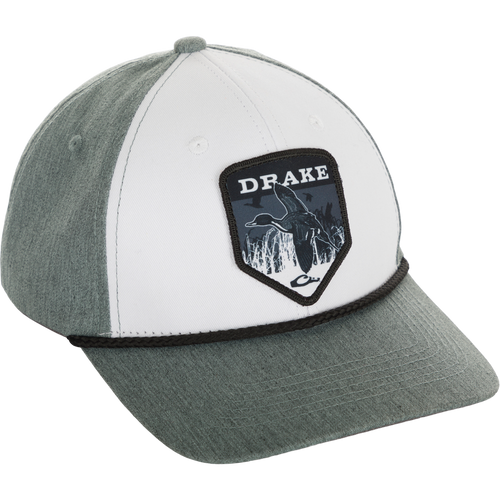 A Drake In-Flight Badge Cap with a patch featuring a flying duck.